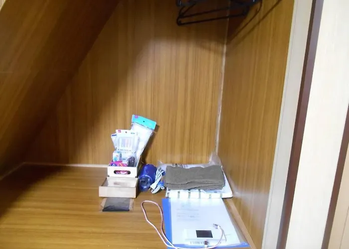ペット可でusj まですぐ 木を基調としたログハウス調のお部屋