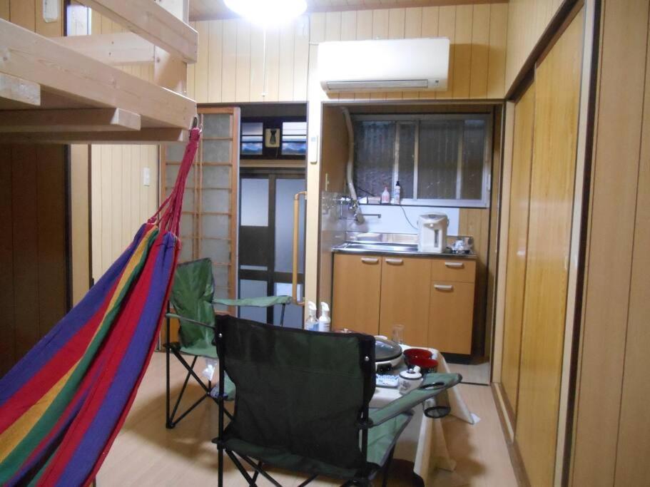 Apartment ペット可でusj まですぐ 木を基調としたログハウス調のお部屋