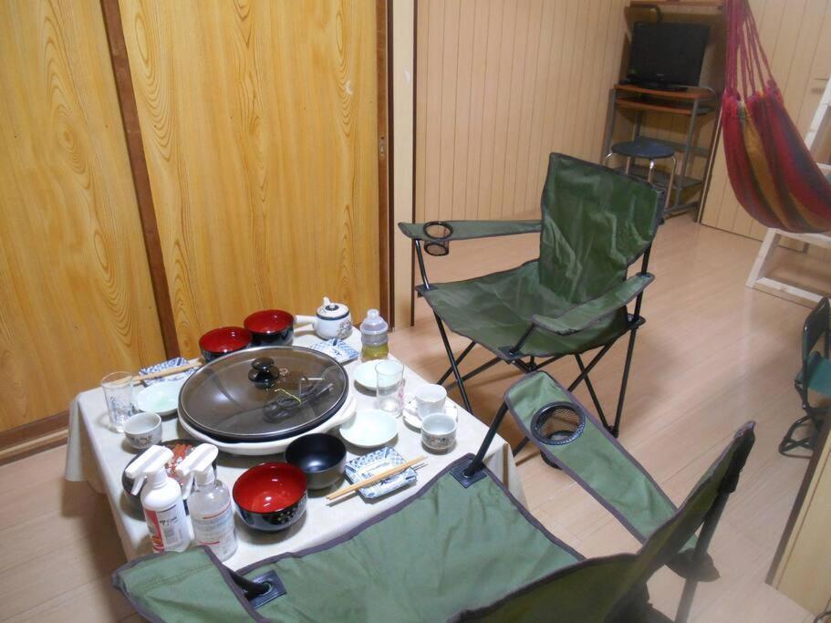ペット可でusj まですぐ 木を基調としたログハウス調のお部屋